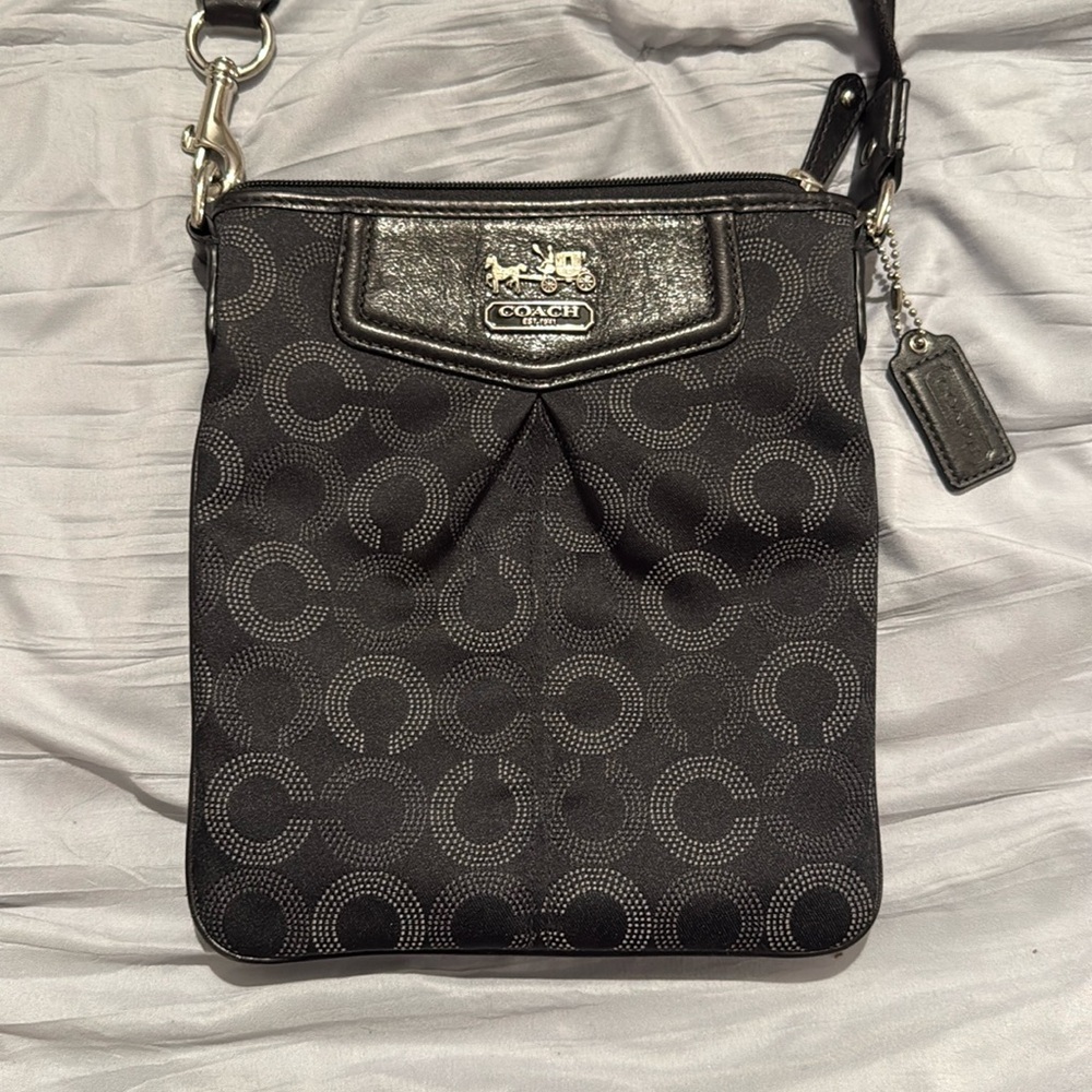 Coach Black Crossbody Bag with signature monogram.